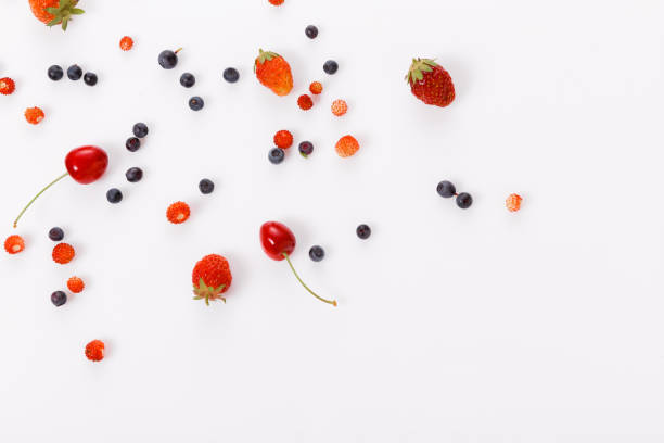 istock Fresh summer berries, strawberries, raspberries, blueberries, cherries on a white background 1257748905