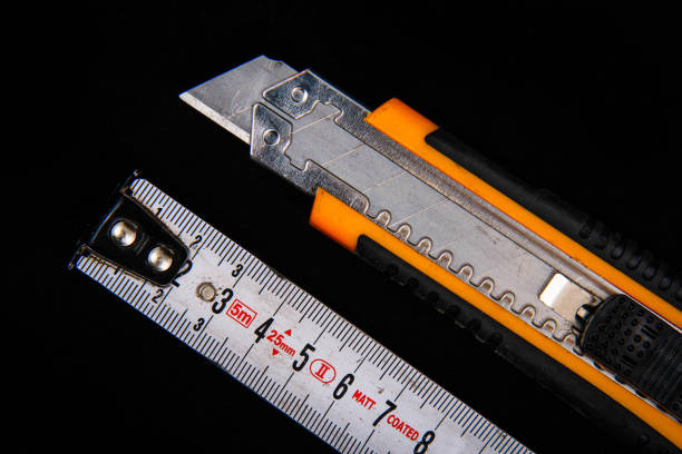 istock Measuring tape and cutting blade for cutting. 1257749168