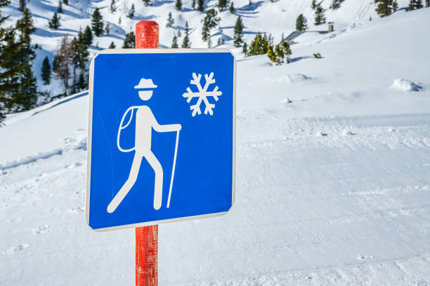 sign for a winter hiking trail in austria - photo