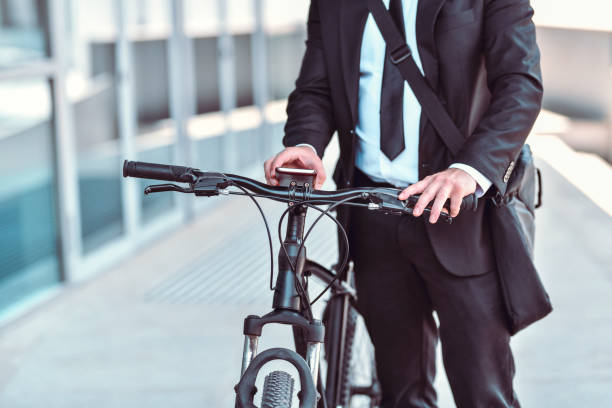 istock Elegant Male Setting Up Smartphone On Bicycle 1257751160