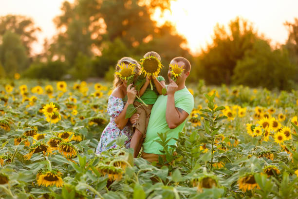 Beautiful Caucasian woman posing for camera with little girl. Summer vacation concept