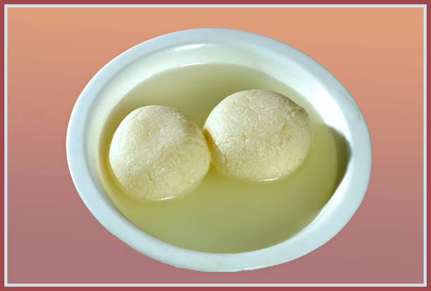 Rosogolla Indian bengali sweet dish Rashgulla,also know as Rosogolla, is a syrupy dessert India. rosogolla stock pictures, royalty-free photos & images