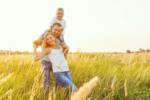 istock Happy family having fun outdoors 1257752549