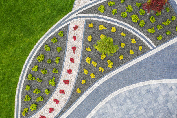 istock Front Yard Garden with Brick Paved Driveway Aerial View 1257752567