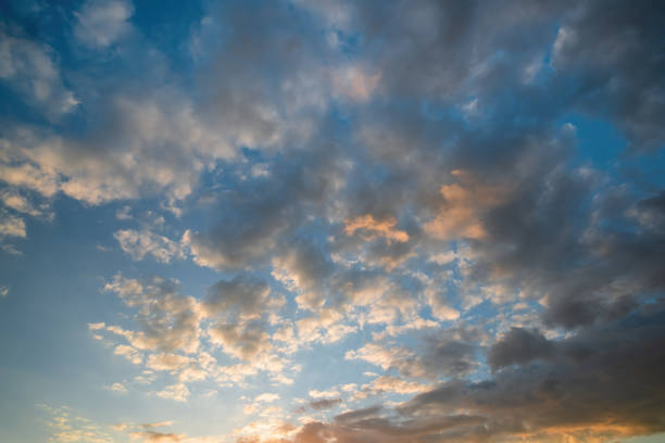 istock Majestic clouds burning by sunrise. Sky background 1257753709