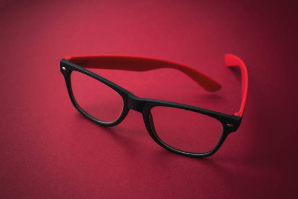 istock Red glasses Eye Glasses On red. Glasses. 1257753861