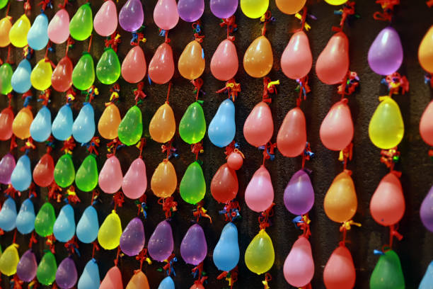 istock Multi Colored Water Balloon Hanging On The Wall 1257757892