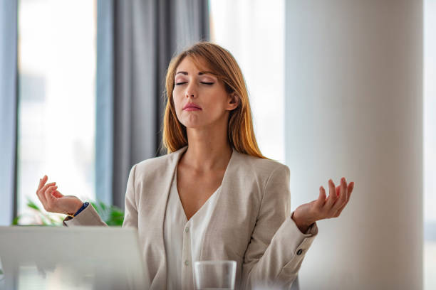 istock Millennial female designer practicing yoga meditation. 1257759605