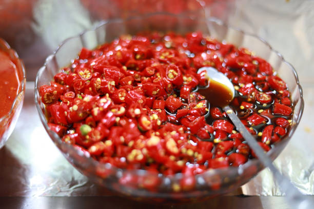 istock Close-up of chopped chilies in a bowl 1257759948