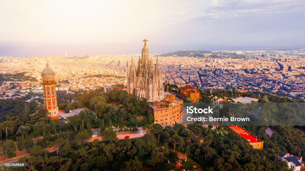 Beautiful aerial view of Sacred Heart of Jesus Temple in Tibidabo mountain. Panoramic view of Barcelona Beautiful aerial view of Sagrado corazón de Jesús temple in Tibidabo mountain. Panoramic view of Barcelona city Tibidabo Stock Photo