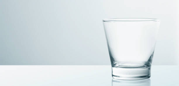 istock Water glass isolated on with background 1257771984