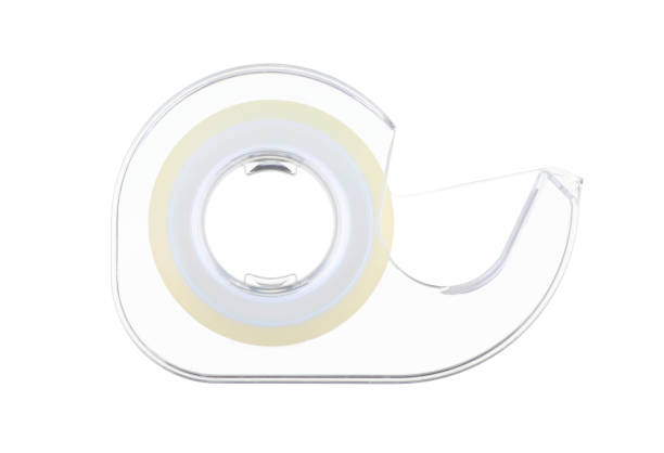 Sticky tape dispenser on white with clipping path A sticky tape dispenser on white with clipping path nigel pack stock pictures, royalty-free photos & images