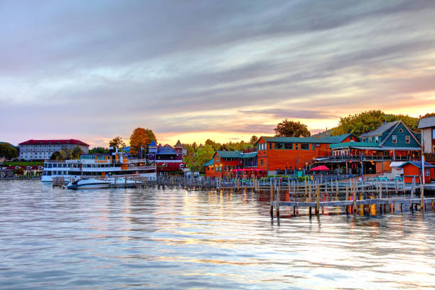 Aerial photo of fall foliage surrounding the Town of Skaneateles, Skaneateles Lake, Onondaga County, New York State, November 2024.