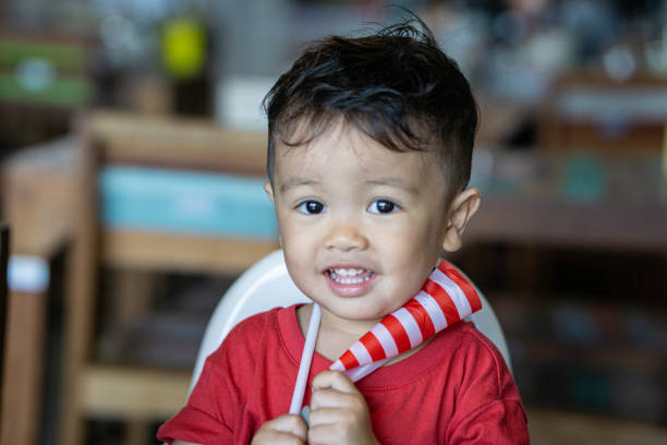 istock Adorable boy holding a Malaysia flag 1257778207
