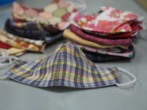 istock fabric group face mask cloth self prevention ill for protect dust and germs pm 2.5, coronavirus covid-19 1257780245