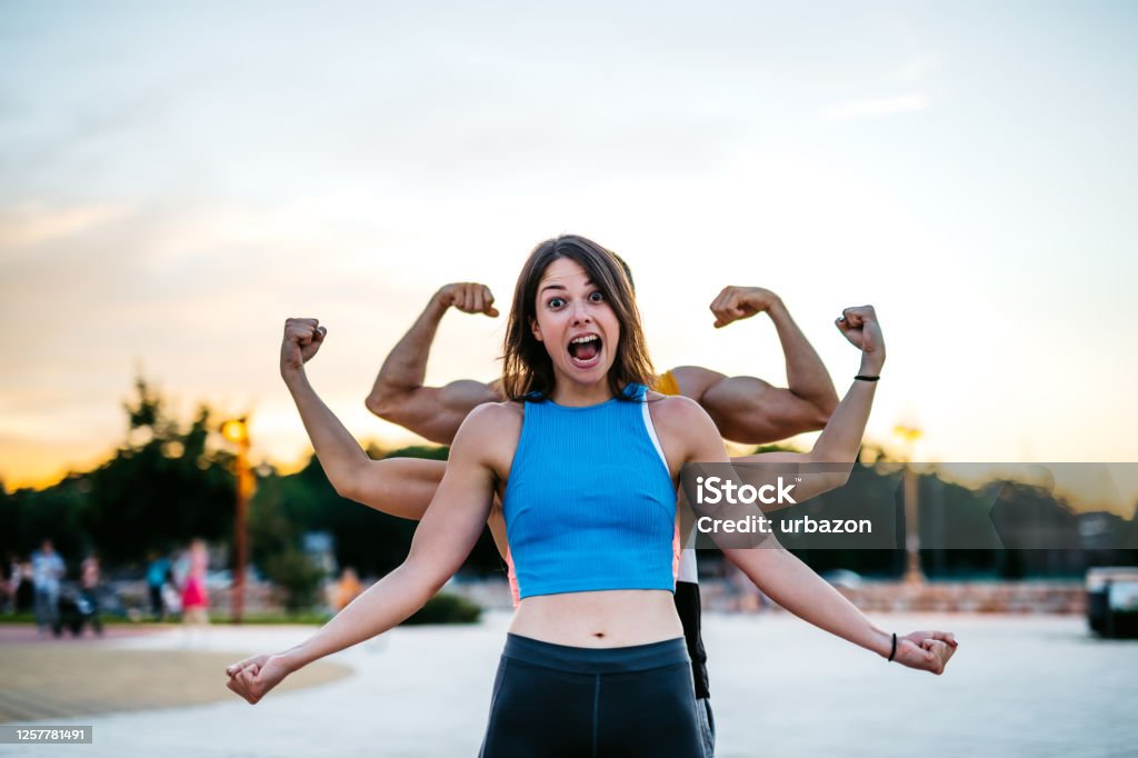 Woman With Very Strong Arms Stock Photo - Download Image Now - Humor,  Sport, Women - iStock