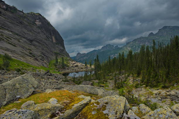 istock A quiet lake among rocks and dense taiga 1257782951
