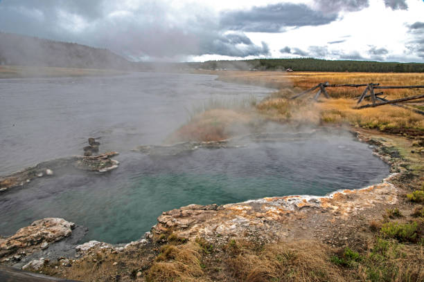 istock Active geysers next to clear cold waters in Yellowstone. 1257783723