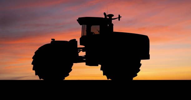 istock Silhouette of an agricultural tractor 1257786033