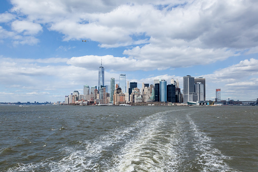 New York, New York - April 5, 2018: A view of the Lower Manhattan skyline from the Staten Island Ferry