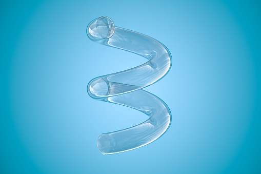 Empty glass spring tube with blue background, 3d rendering. Computer digital drawing.
