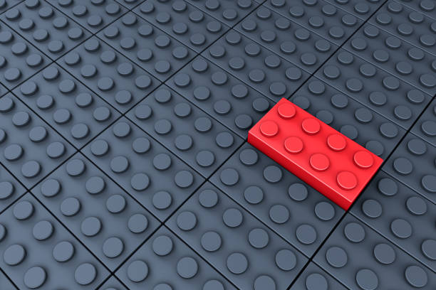istock 3d rendering of toy blocks on black background. 1257789848