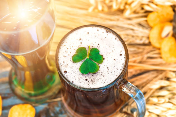 istock Mug light beer, green Irish beer in Patricks Day 1257792481