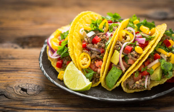 istock Mexican food - fresh tacos with ground meat 1257797589