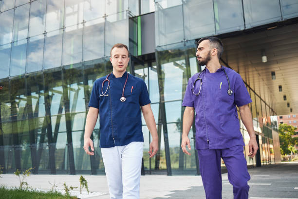 istock Tired first responder taking a break to catch some fresh air after exhausted and long shift of patient care 1257798353