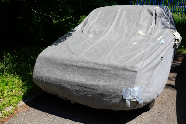 istock A car hidden under the tarpaulin 1257799859