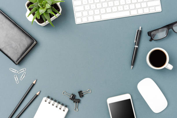 istock Overhead shot of business desktop with computer and mobile 1257806621