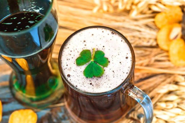 istock Mug light beer, green Irish beer in Patricks Day 1257808415