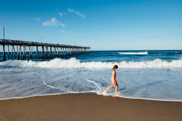 istock Girl Exploring the Outer Banks 1257810649