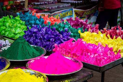Raipur, India - March 08, 2020: Color powder for sale in local Indian market, in Raipur.