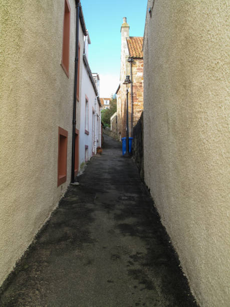 Side street in a small town in Scotland, possibly Edinburgh. Taken on a trip in 2012, such alleyway are characteristic of the area.