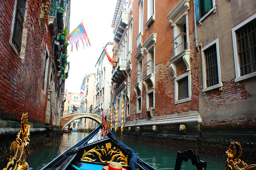 A romantic gondola ride through the canals of Venice, Italy.