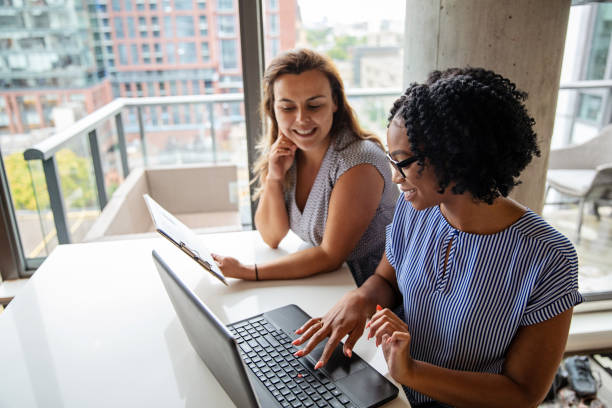 istock Two Females Working 1257822950