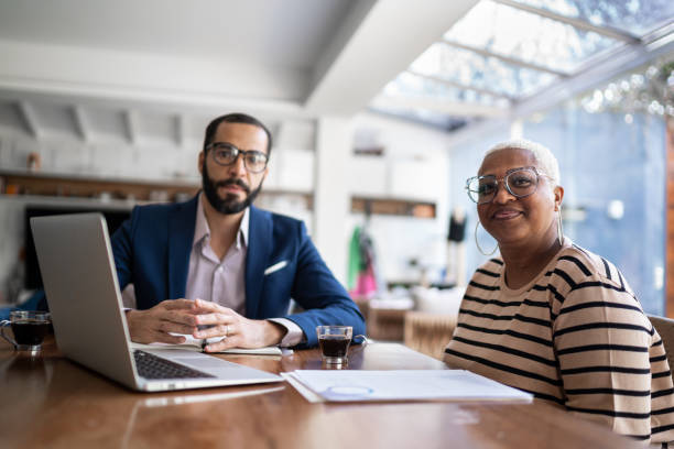 istock Portrait of client and finance advisor 1257827759