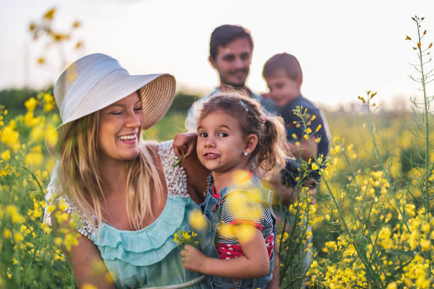 istock Young happy family enjoying nature 1257833159