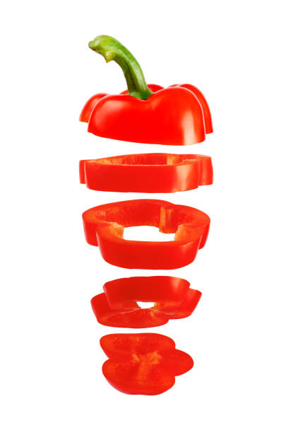 istock Red flying pepper isolated on white background. Levitating paprika. Sliced floating pepper. Levity vegetable. Food concept. 1257833541