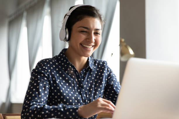 istock Smiling young indian student attending educational lecture online. 1257836730