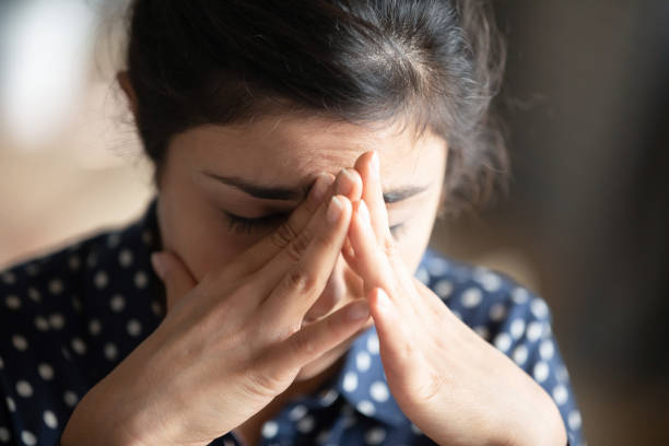 istock Head shot depressed young indian woman feeling exhausted. 1257836775