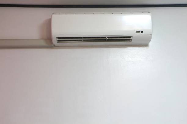 istock Air conditioner on white concrete wall. 1257837031