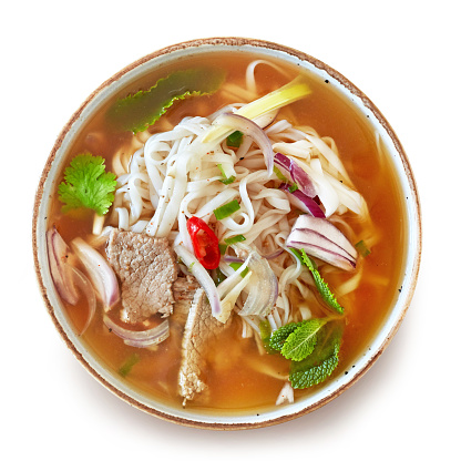 bowl of vietnamese PHO soup isolated on white background, top view