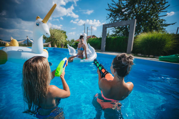 istock Water fight between friends 1257842891