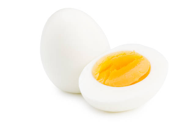 istock Single whole boiled egg with halved egg isolated on a white background 1257843871