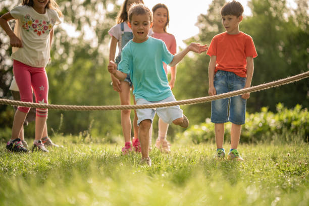 istock Little boy is having fun while skipping jump rope 1257844208