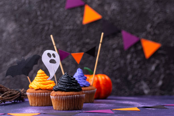 istock Halloween cupcakes with color cream 1257845072