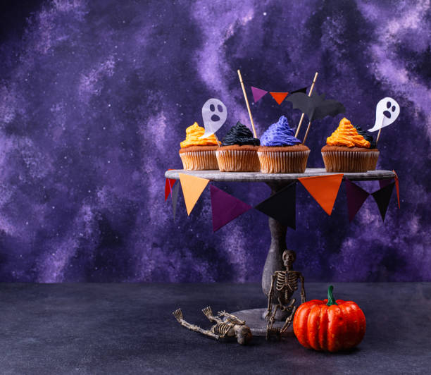 istock Halloween cupcakes with color cream 1257845087