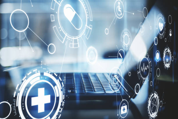 istock Blurry laptop with creative glowing blue medical hologram 1257845213
